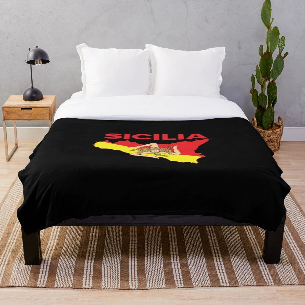 Cozy plush blanket featuring the map of Sicily and the Trinacria symbol, representing Sicilian pride