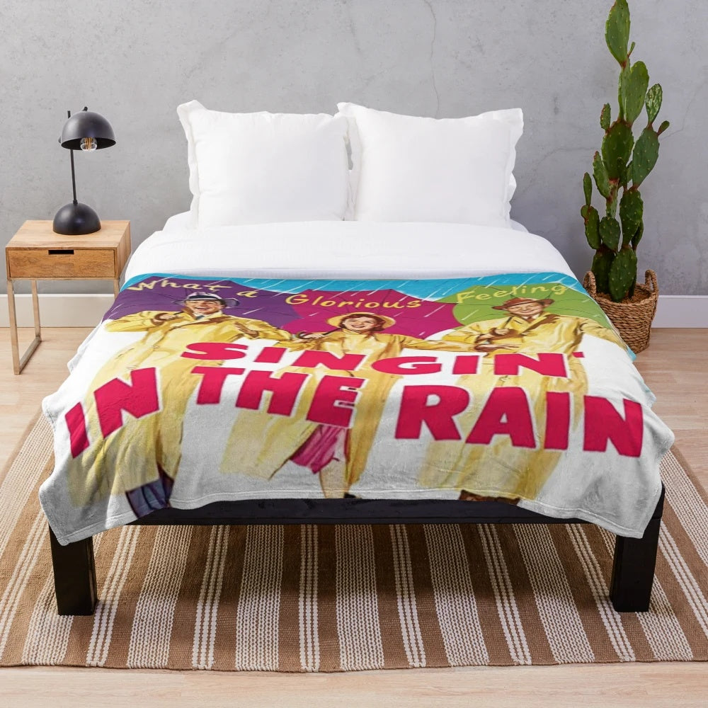 Plush blanket featuring a vintage 'Singing in the Rain' scene