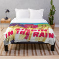 Plush blanket featuring a vintage 'Singing in the Rain' scene