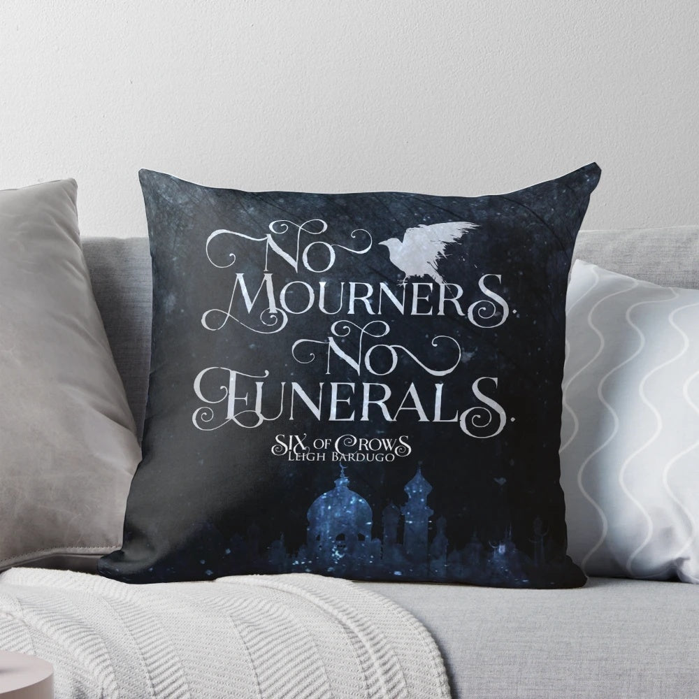 Six of Crows-inspired pillow featuring Kaz Brekker and the "No Mourners No Funerals" quote, perfect for bookish home decor.