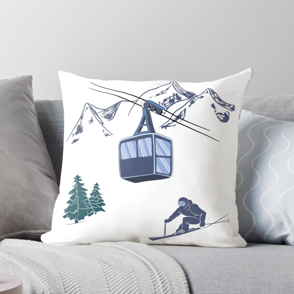 A plush pillow featuring a snowy winter sports scene with skiers on a ski lift against a backdrop of powdery hills.
