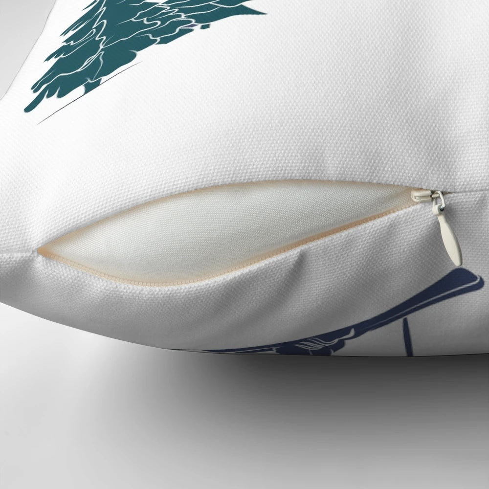 A plush pillow featuring a snowy winter sports scene with skiers on a ski lift against a backdrop of powdery hills.