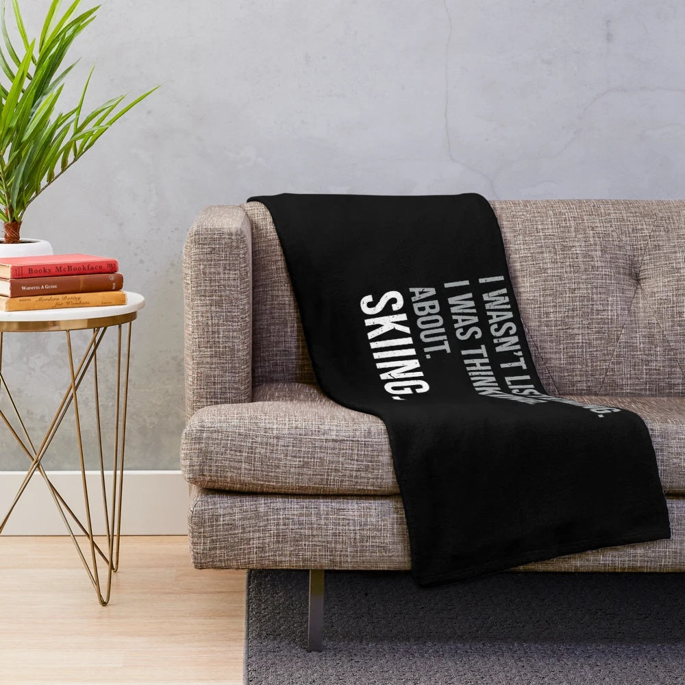 Cozy plush blanket for ski enthusiasts featuring a vintage ski design