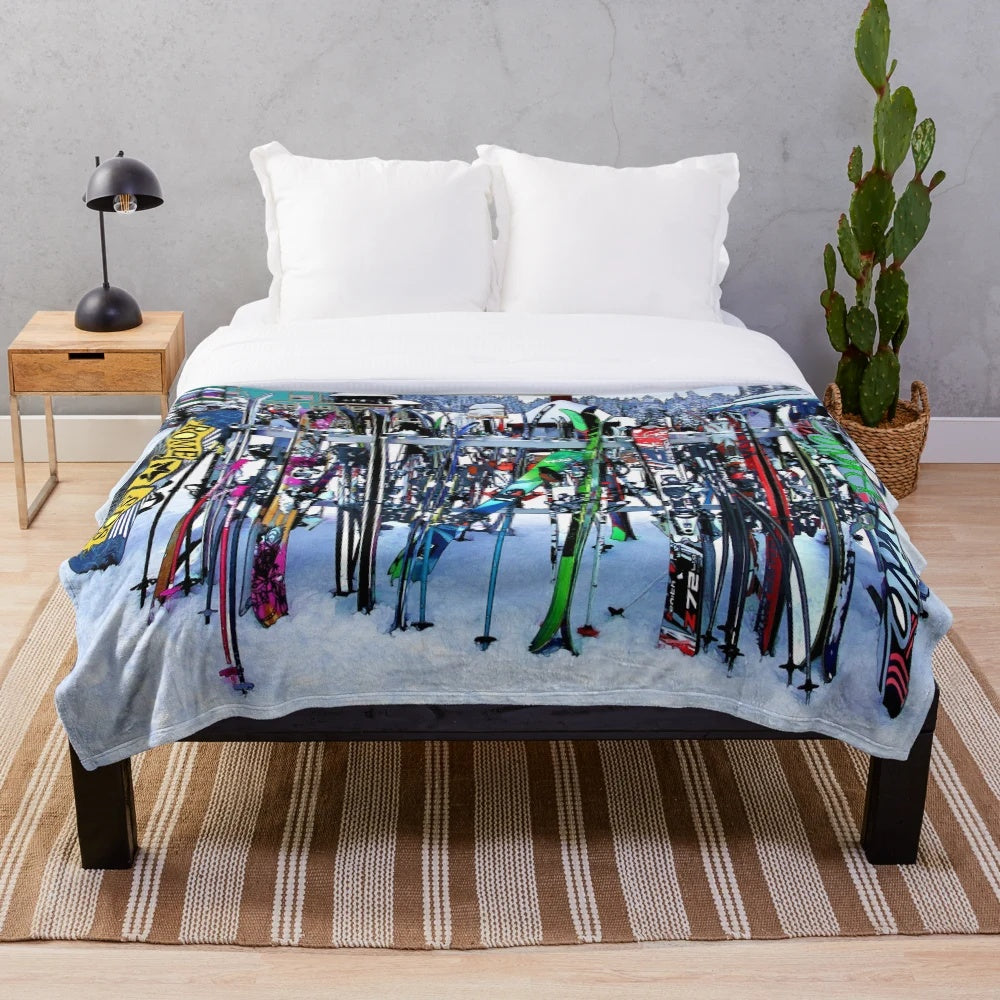 Plush blanket featuring skis and poles design, perfect for winter sports enthusiasts