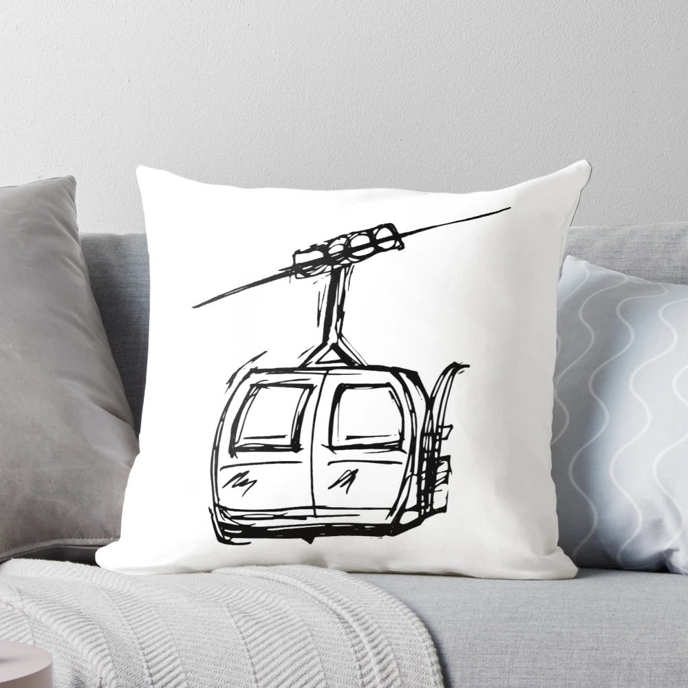 A plush and decorative pillow featuring a mountain gondola chairlift design, perfect for ski and snowboard lovers.