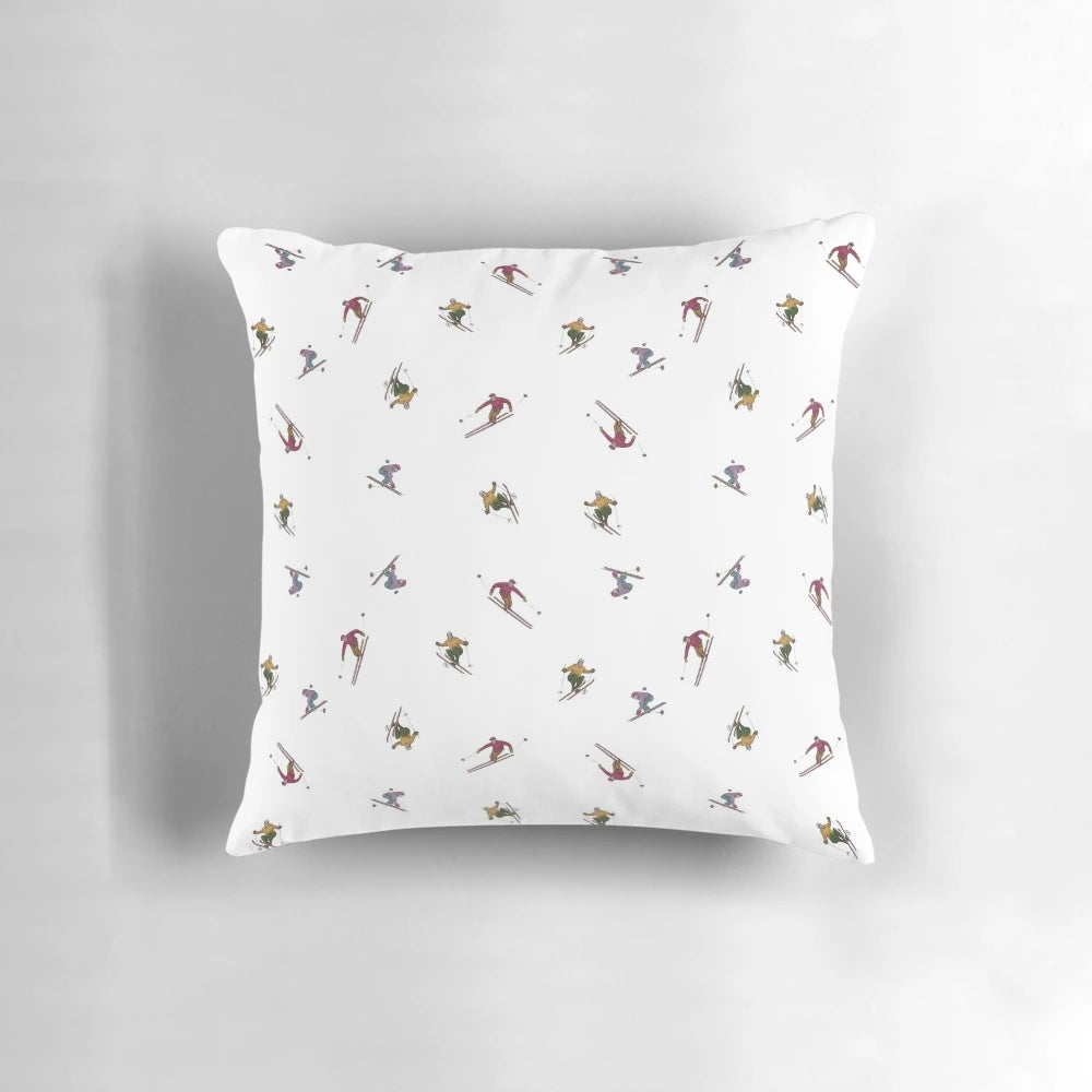 A soft, plush pillow featuring a winter sports pattern design