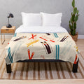 Plush blanket with skiing pattern design