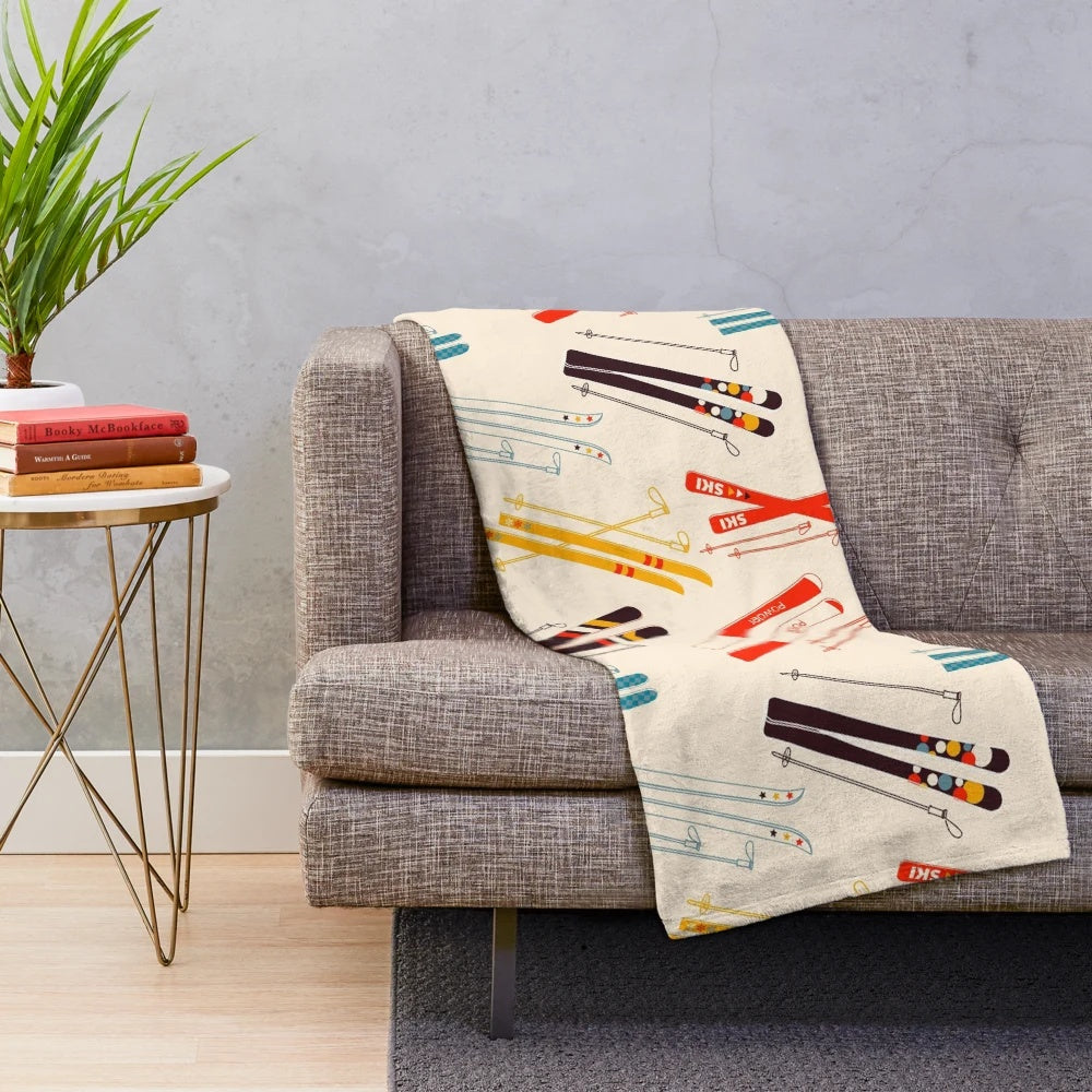 Plush blanket with skiing pattern design