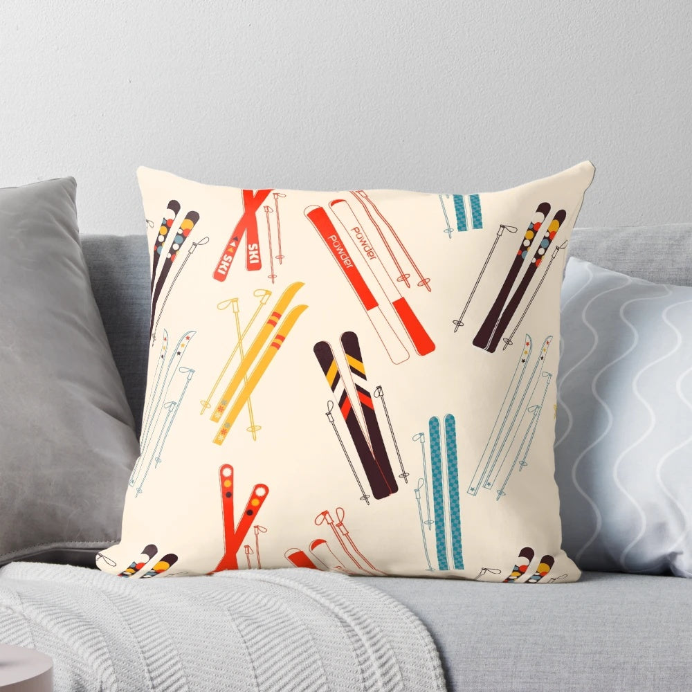 Skiing-themed decorative pillow featuring a snow-covered mountain landscape