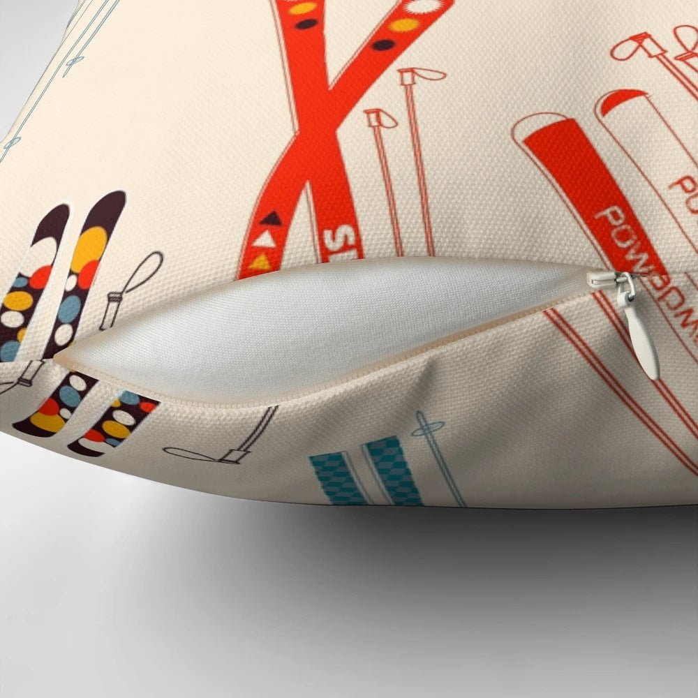 Skiing-themed decorative pillow featuring a snow-covered mountain landscape