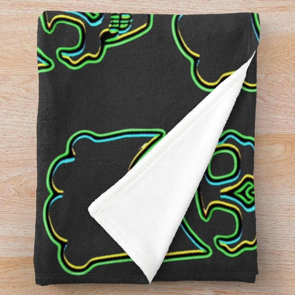 Green plush blanket with a skull chef design, great for kitchen and cooking enthusiasts