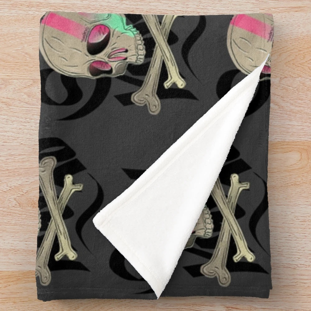 Soft, plush skull-patterned blanket for cozy and spooky home decor