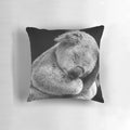 Soft, cuddly pillow in the shape of a sleeping koala