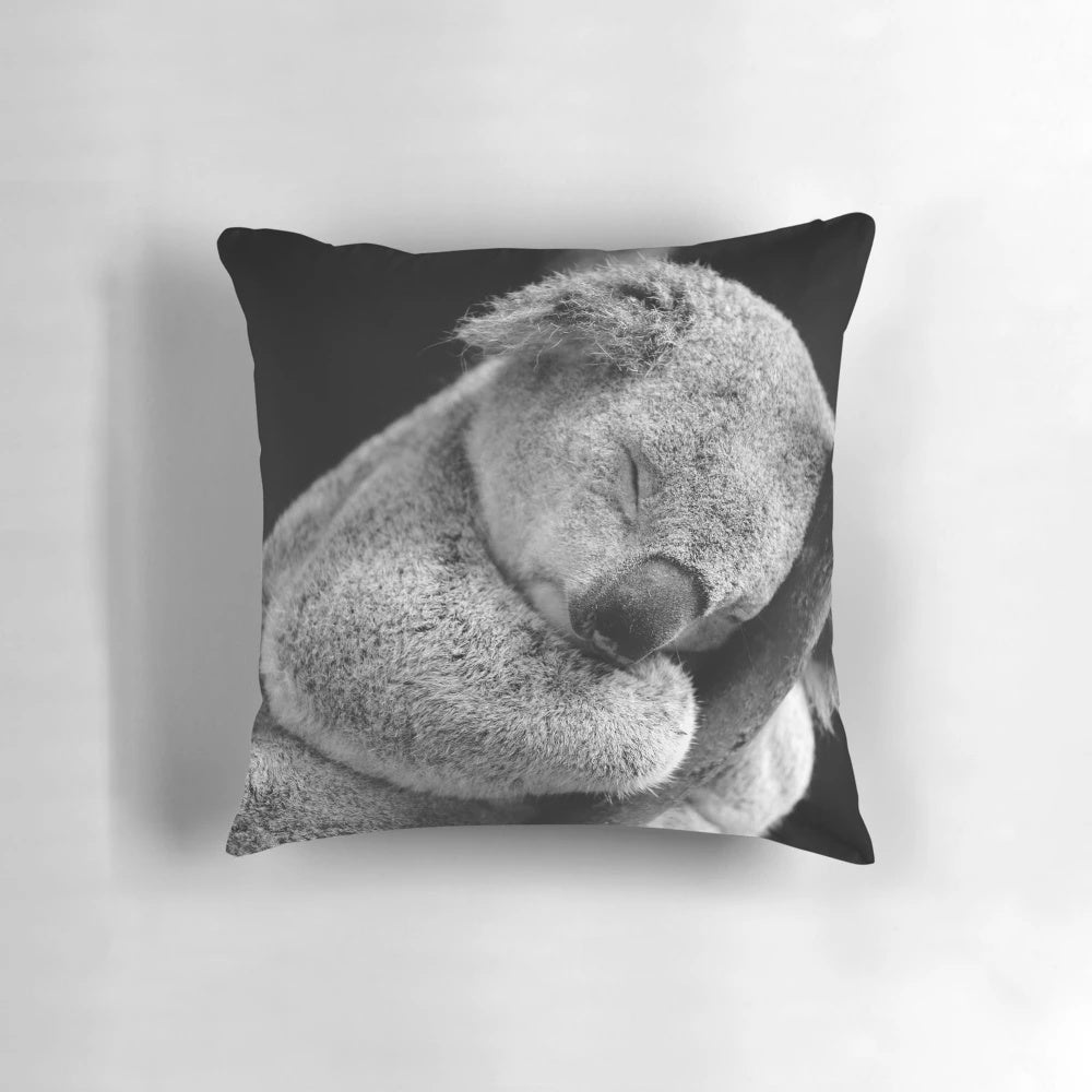 Soft, cuddly pillow in the shape of a sleeping koala