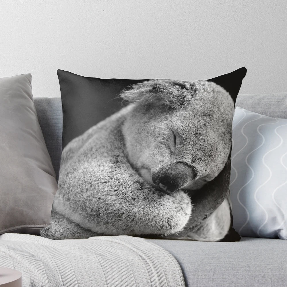Soft, cuddly pillow in the shape of a sleeping koala