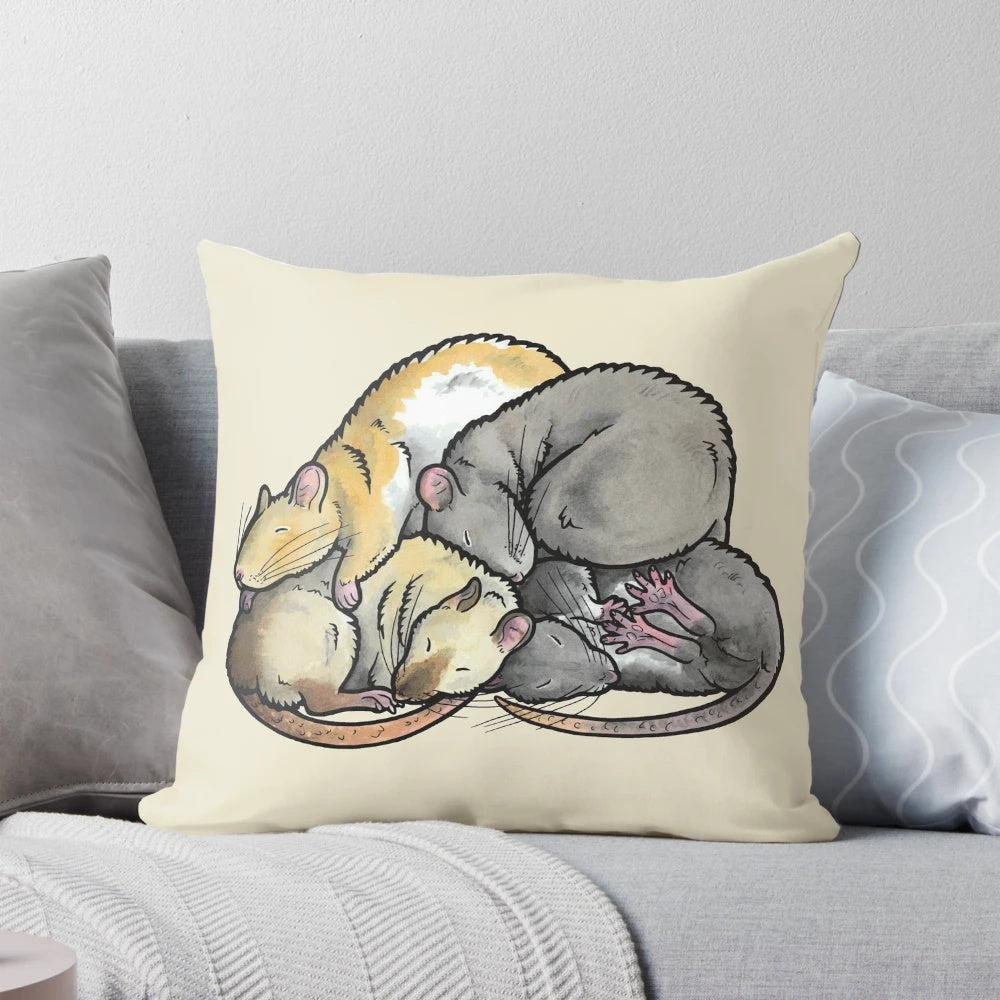 Adorable sleeping pet rats cuddled together in a soft, plush pillow