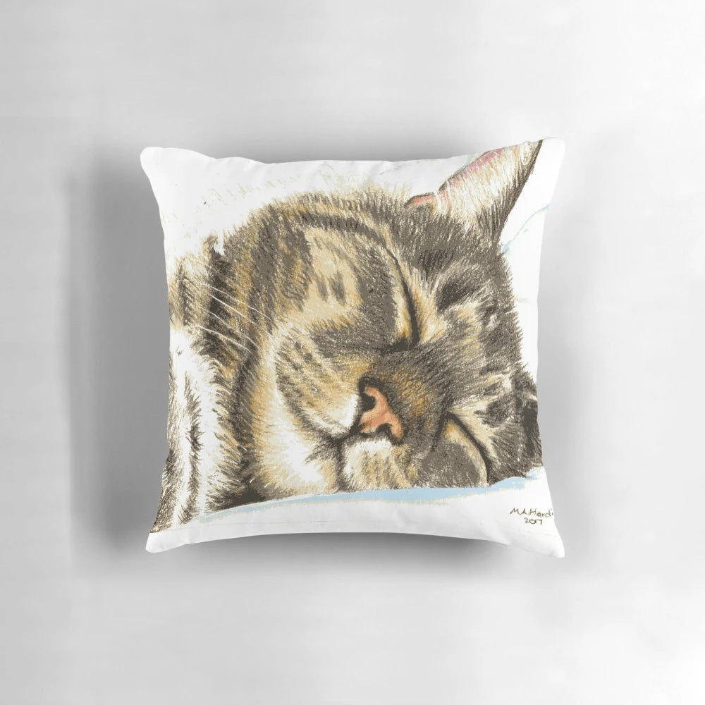 Soft and plush pillow featuring a sleeping tabby cat illustration, perfect for cat enthusiasts.