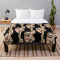 Soft and plush sloth-themed blanket with sloth sitting on a tree branch