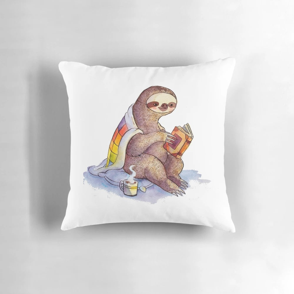 Cozy sloth pillow with a watercolor design of a cute sloth, perfect for a reading nook or cozy home.