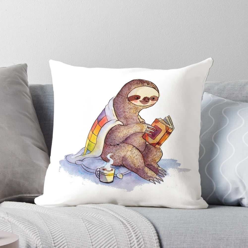 Cozy sloth pillow with a watercolor design of a cute sloth, perfect for a reading nook or cozy home.