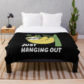 Sloth plush blanket with relaxed and humorous pop culture design