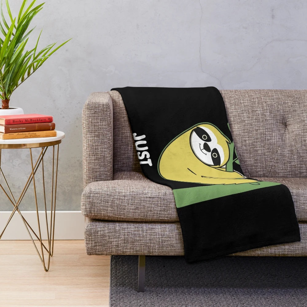 Sloth plush blanket with relaxed and humorous pop culture design