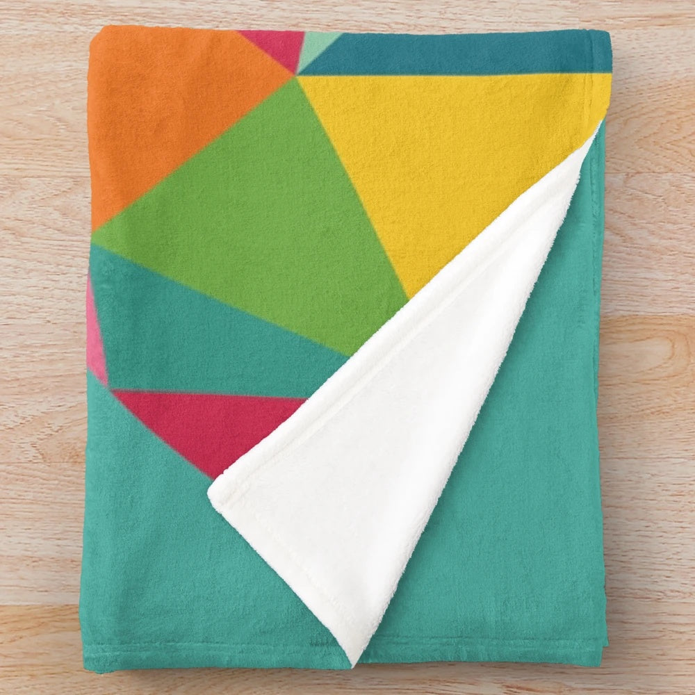 Colorful geometric patterned plush blanket with a surfing sloth design
