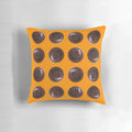 Soft, plush pillow in the shape of a small Jaffa Cake, featuring a chocolate and orange design.