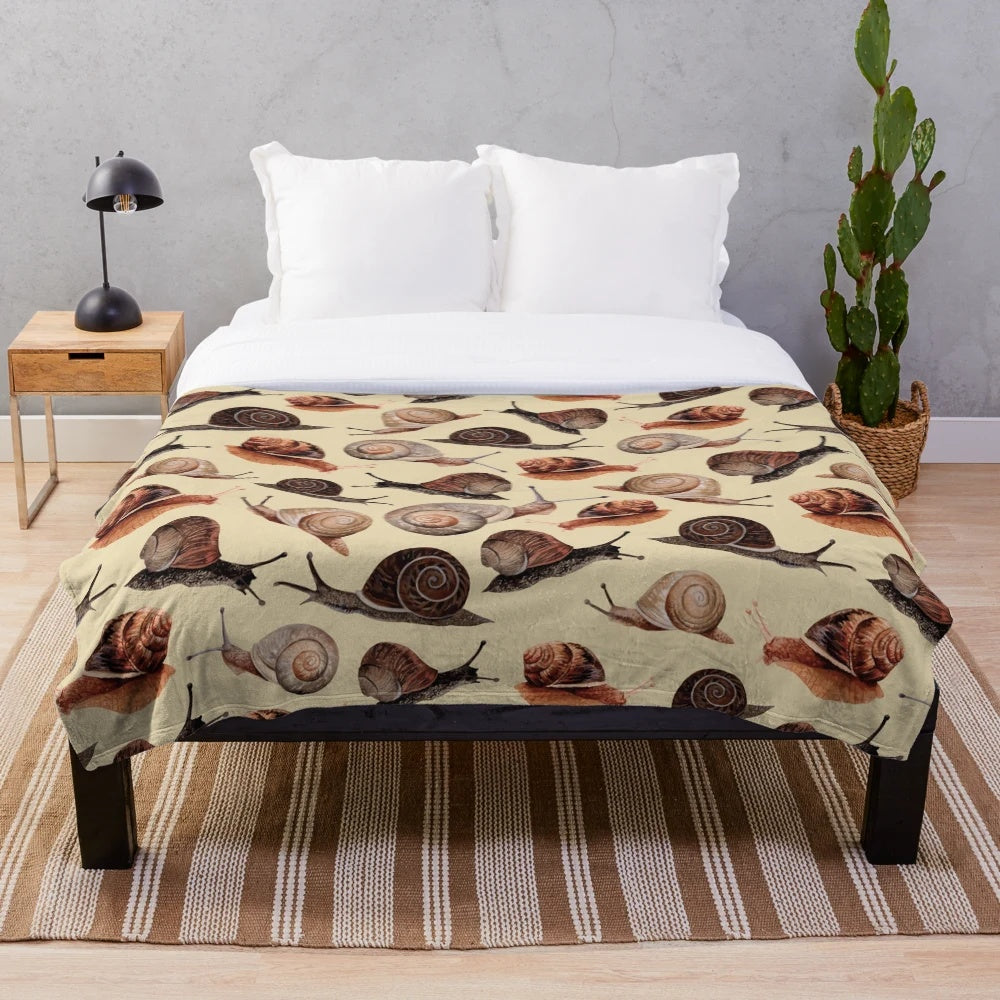Snail plush blanket with shell and nature inspired design