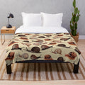 Snail plush blanket with shell and nature inspired design