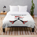 Plush blanket with sneaker design and colors