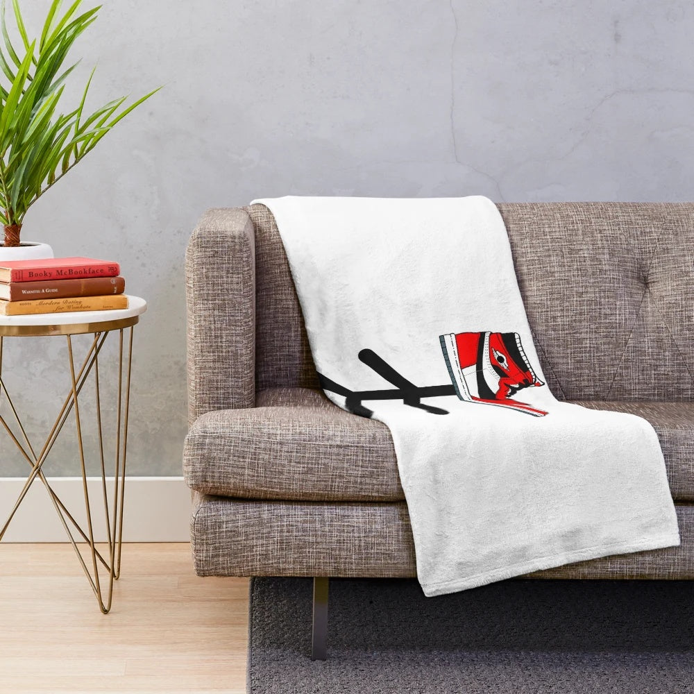 Plush blanket with sneaker design and colors
