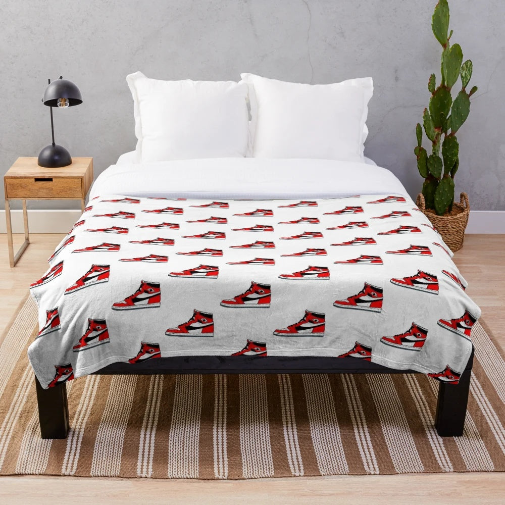 Sneakerhead-inspired plush blanket featuring basketball and sports imagery