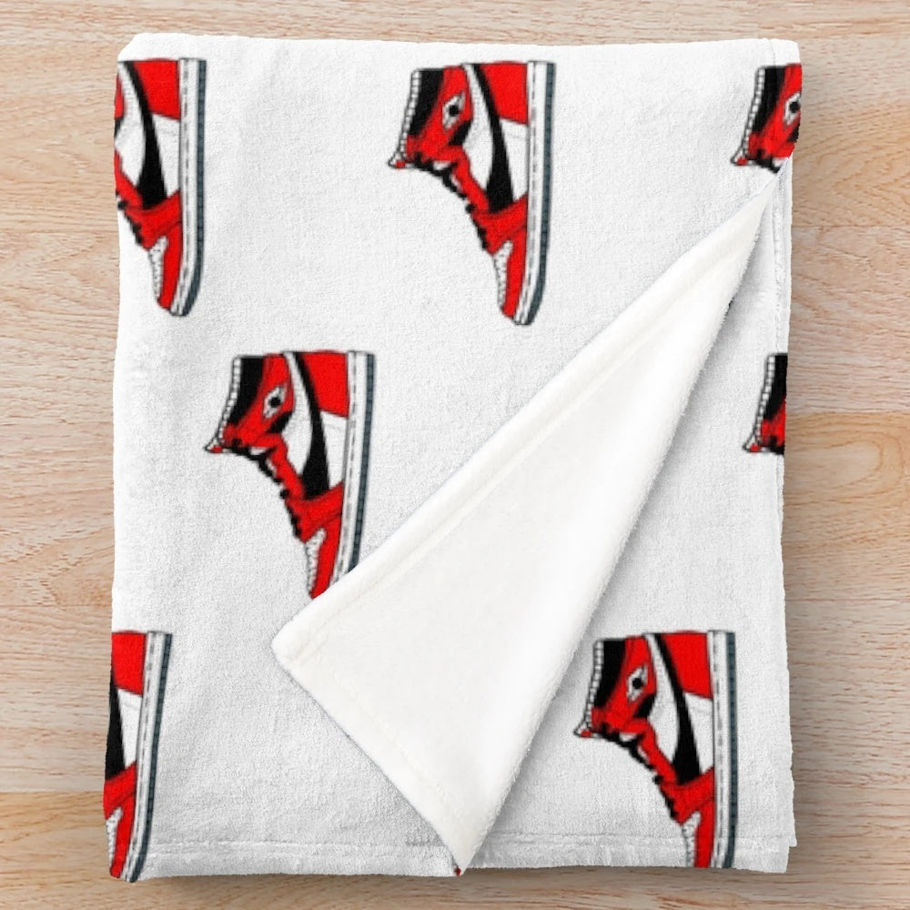 Sneakerhead-inspired plush blanket featuring basketball and sports imagery