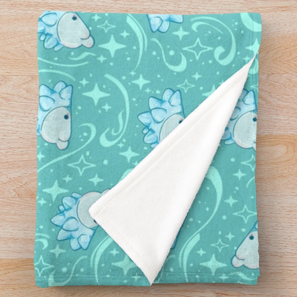 Snom-inspired plush blanket with a soft, snowy pattern