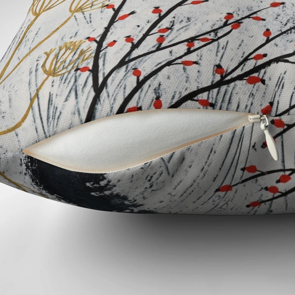A soft, plush pillow featuring a peaceful snow scene with deer in a winter landscape.