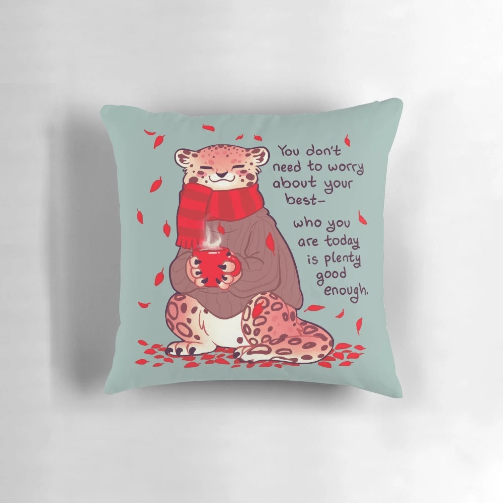 A cozy snow leopard cartoon pillow with the text "Who You Are Today is Plenty Good Enough