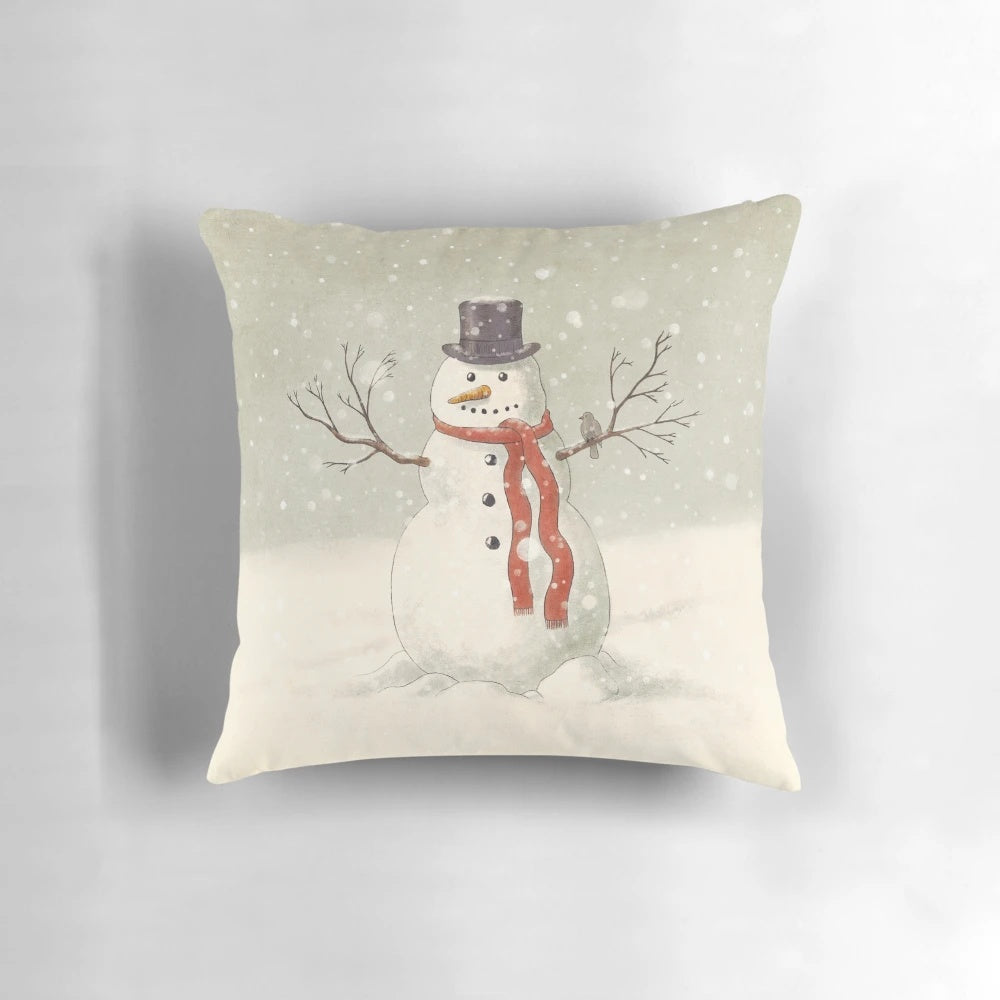 Charming snowman illustration on a soft, plush pillow for cozy winter and holiday decor.