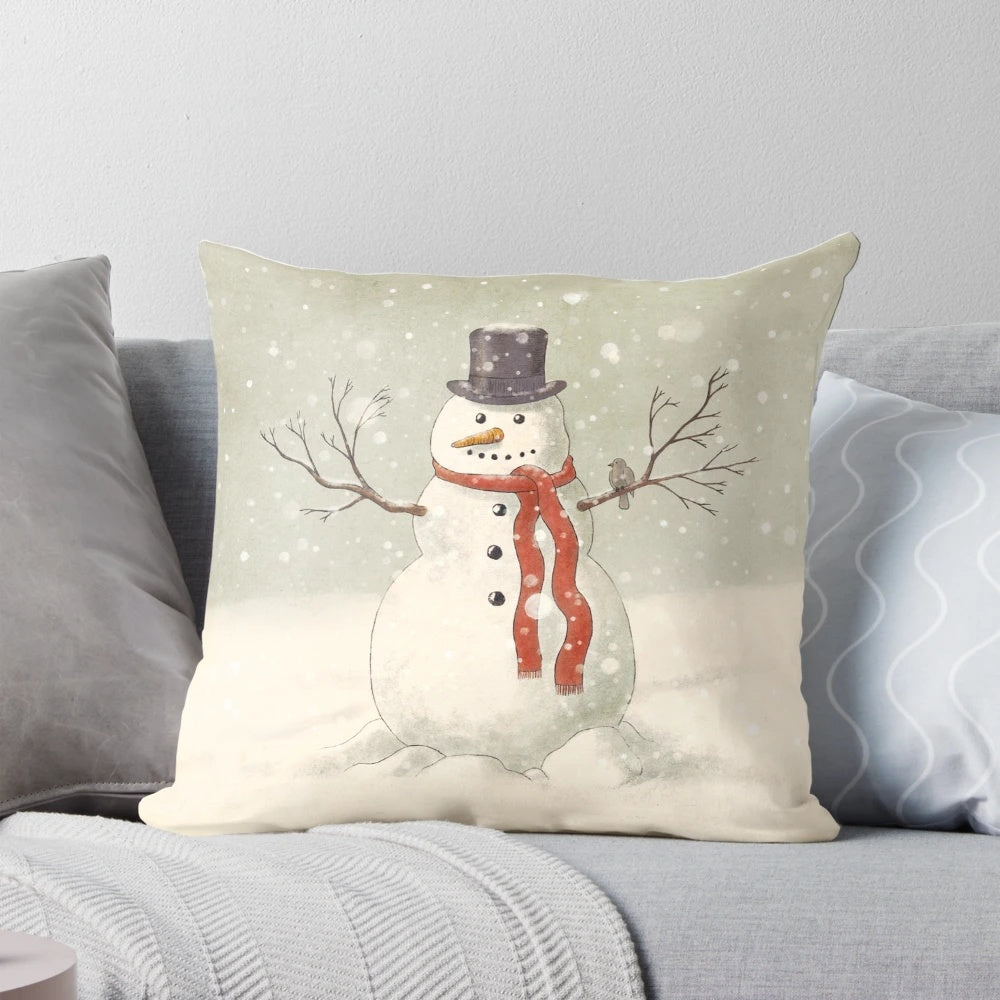 Charming snowman illustration on a soft, plush pillow for cozy winter and holiday decor.