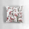 A decorative pillow featuring a minimalist design of snowy berries and branches