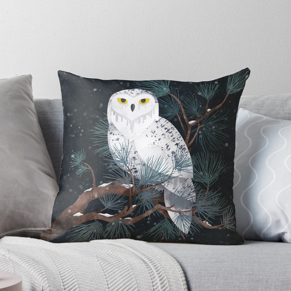 Soft, plush pillow featuring a snowy owl design in a winter forest scene.