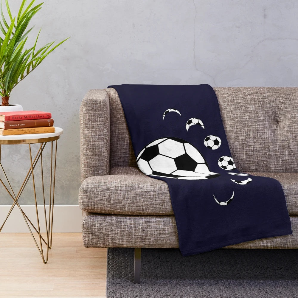 Soccer ball plush blanket with moon and stars design
