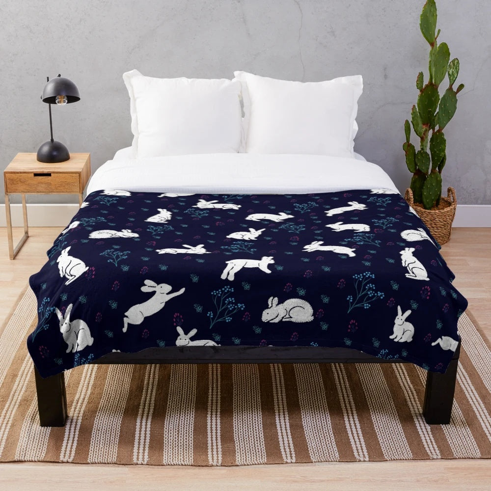 Cozy plush blanket with adorable rabbit pattern design