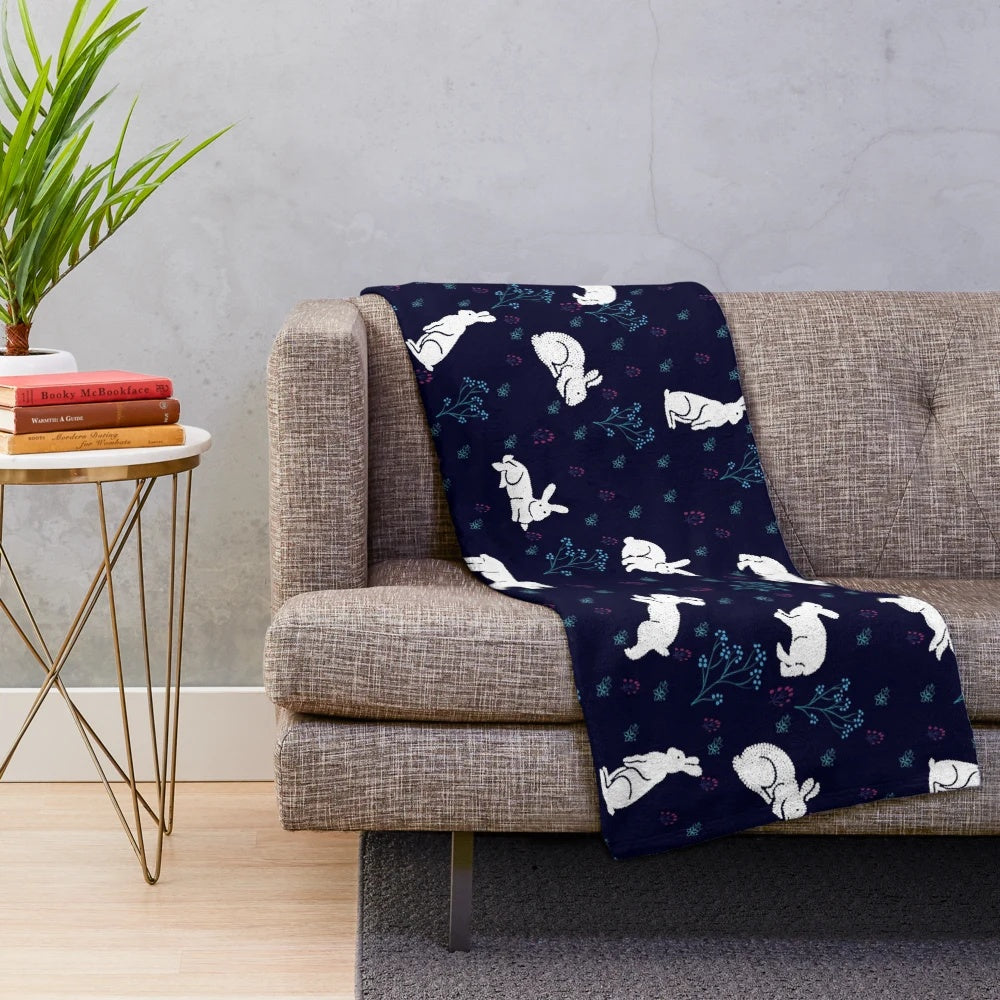 Cozy plush blanket with adorable rabbit pattern design