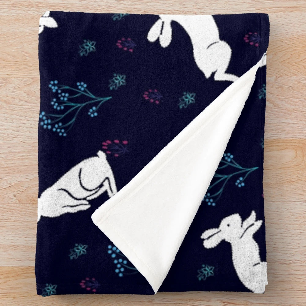 Cozy plush blanket with adorable rabbit pattern design