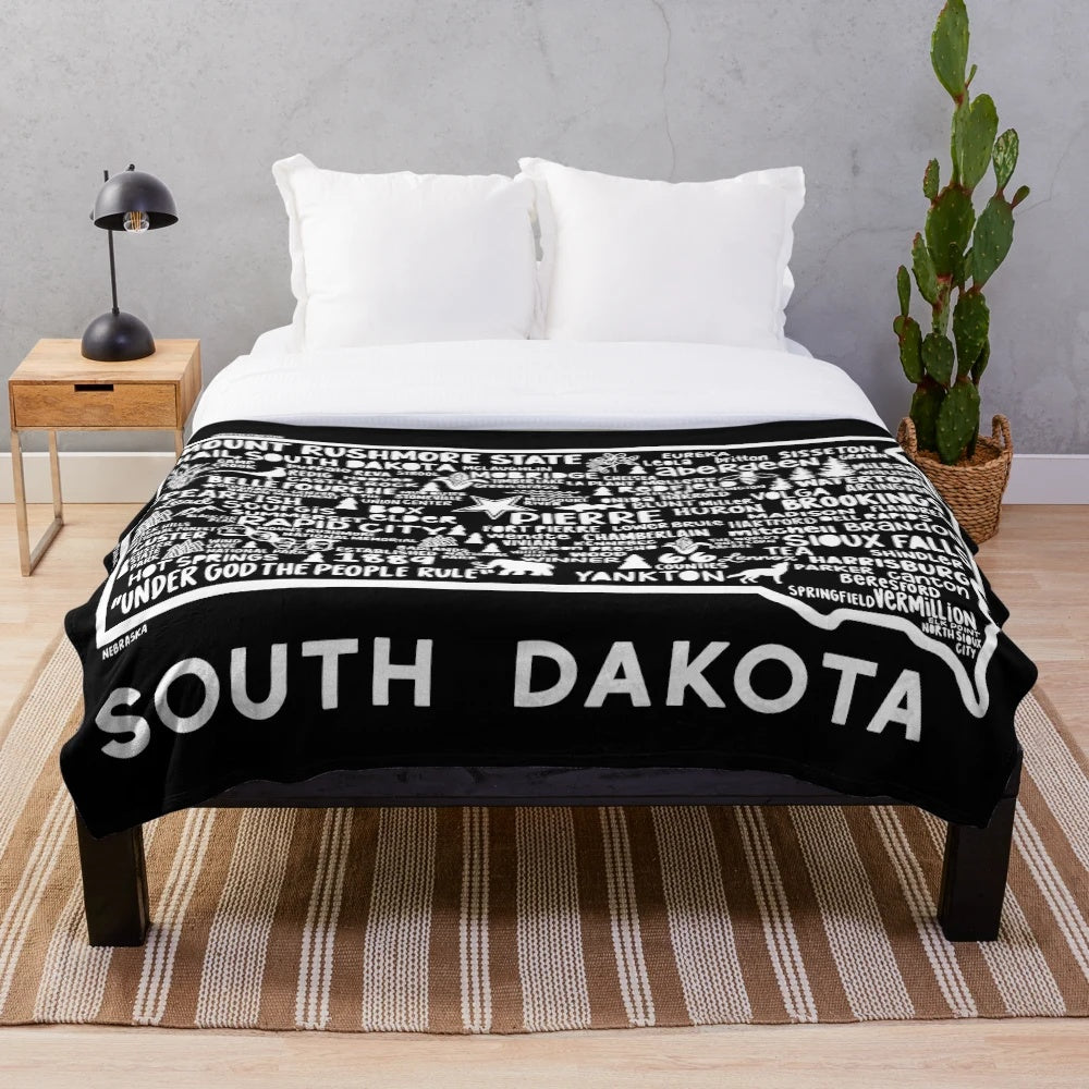 Plush blanket featuring an outline of the state of South Dakota