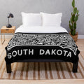 Plush blanket featuring an outline of the state of South Dakota