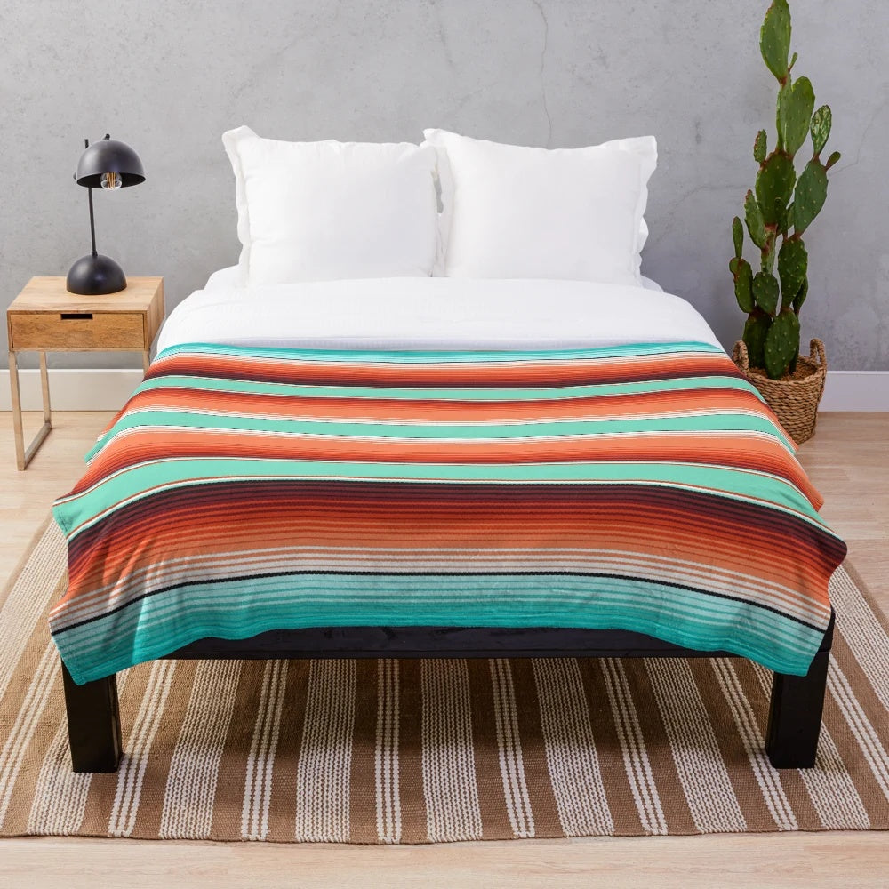 Teal, turquoise and burnt orange southwest inspired plush blanket with serape stripes