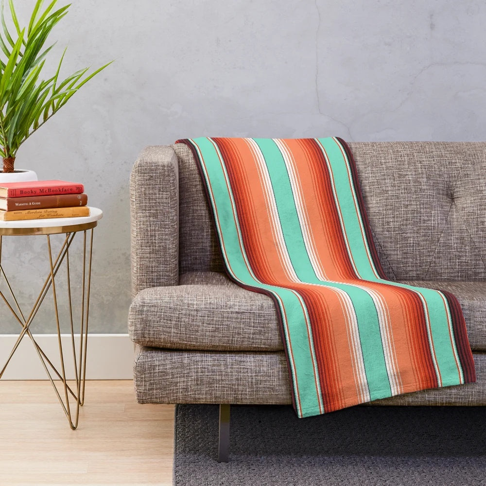 Teal, turquoise and burnt orange southwest inspired plush blanket with serape stripes