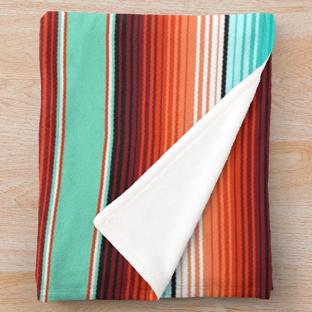 Teal, turquoise and burnt orange southwest inspired plush blanket with serape stripes